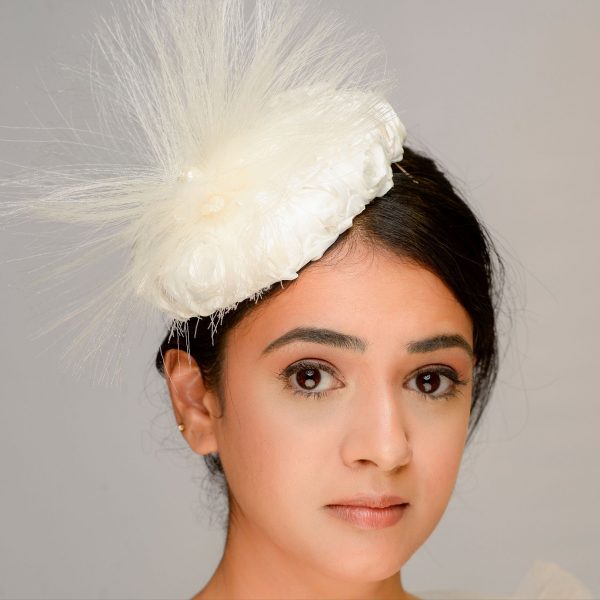 Close up detail of bridal pillbox headpiece finished with crin