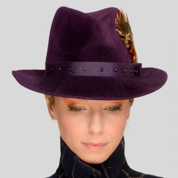 Aubergine fedora with feather hat pin - front