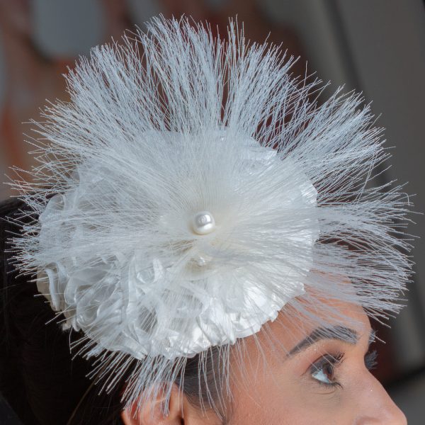 Detail of trim on the bridal pillbox headpiece finished with crin