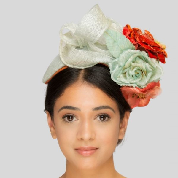 Aquamarine sinamay headband with handmade flowers front view