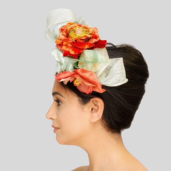 Aquamarine sinamay headband with handmade flowers side view
