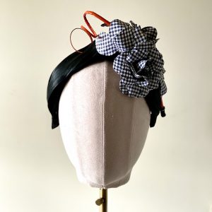 Ava_front view_black silk abaca headband with vintage gingham roses and a contrast quill