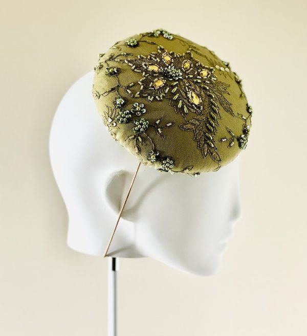 Emily - a mid size perching beanie style headpiece in chartreuse coloured jewelled lace- side view