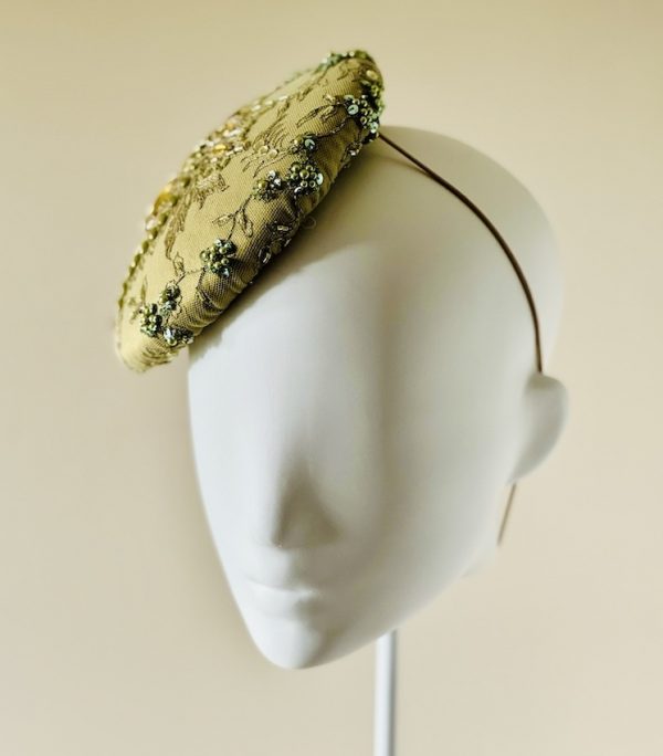 Emily - a mid size perching beanie style headpiece in chartreuse coloured jewelled lace - right view