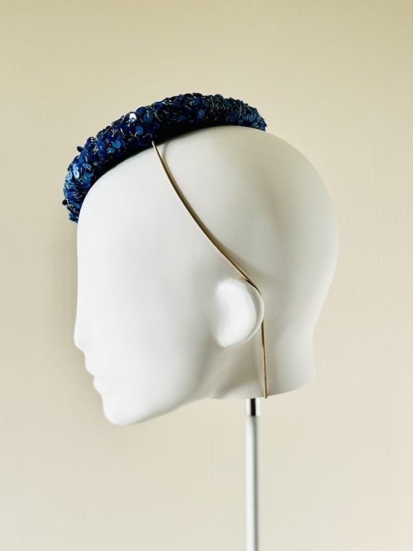 Jenny, a mid size perching beanie style headpiece in cobalt blue sequin beads, left