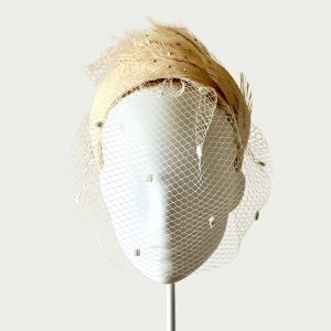 Daisy sinamay halo headband front view with birdcage veil