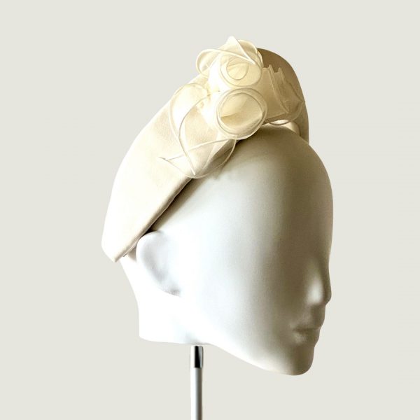 Phoebe ivory crepe halo crown with cotton organdie flowers side detail view