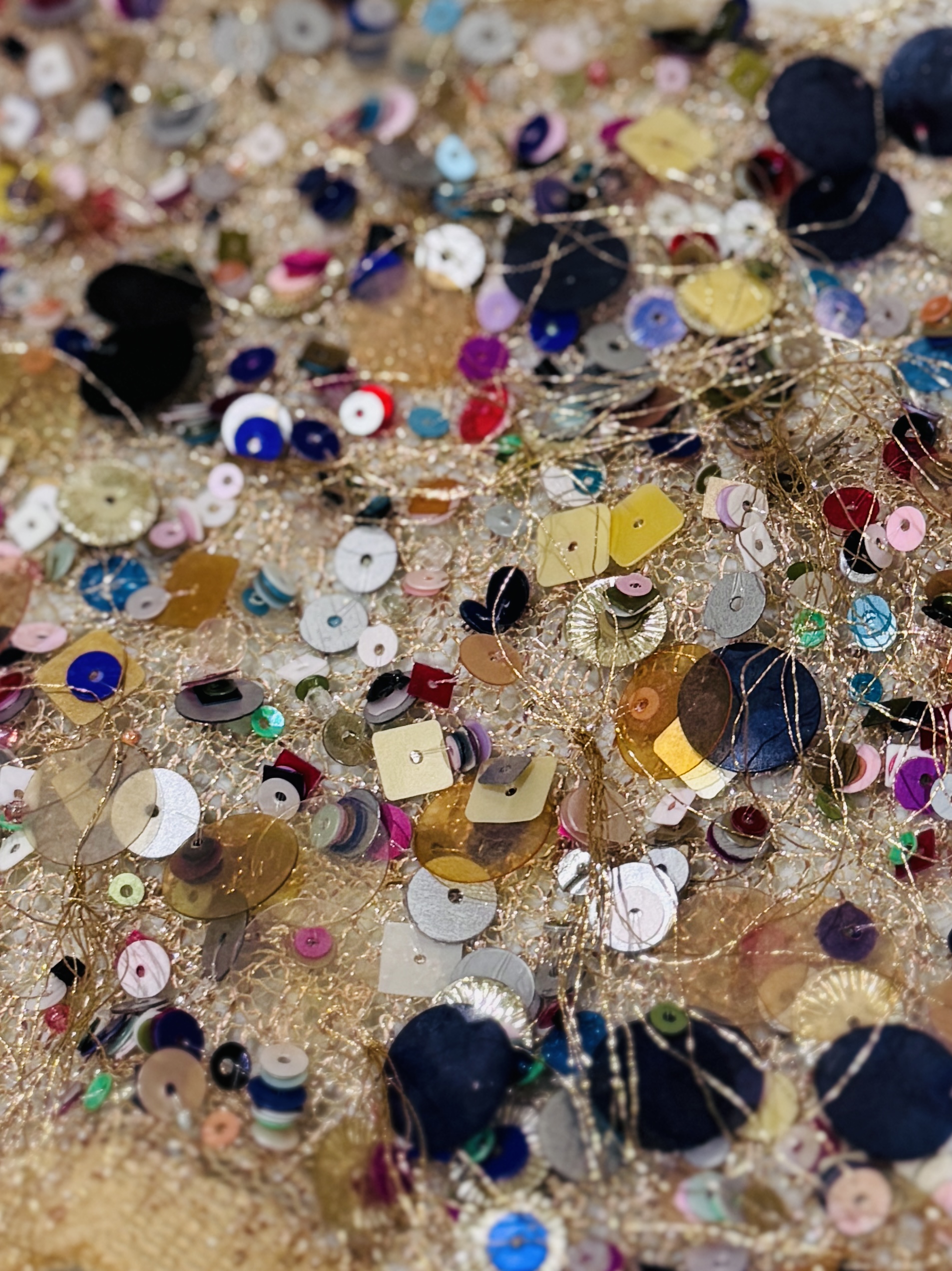 Klimt a gold jewelled moon band halo with multi coloured sequin beads - fabric close-up